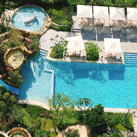 โรงแรมมู่ เจียว สี เจียวซี ภายนอก รูปภาพ The swimming pool at the hotel