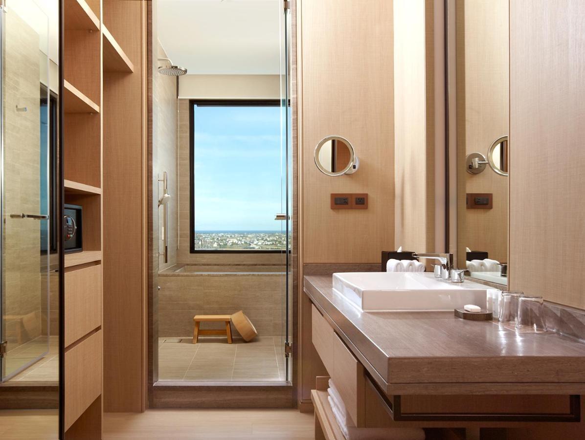 โรงแรมมู่ เจียว สี เจียวซี ภายนอก รูปภาพ Bathroom