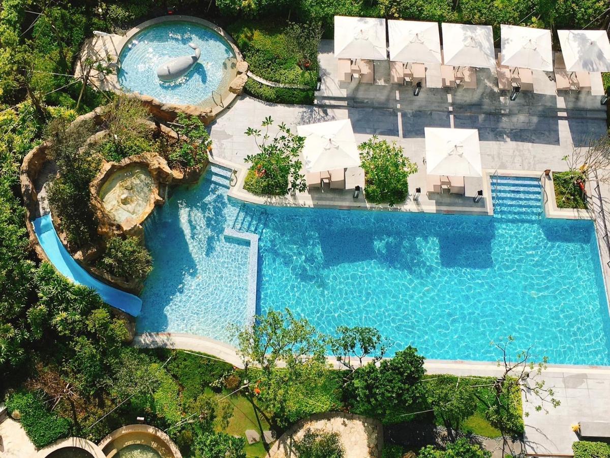 โรงแรมมู่ เจียว สี เจียวซี ภายนอก รูปภาพ The swimming pool at the hotel