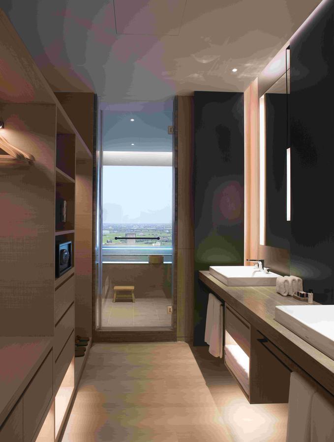 โรงแรมมู่ เจียว สี เจียวซี ภายนอก รูปภาพ Bathroom