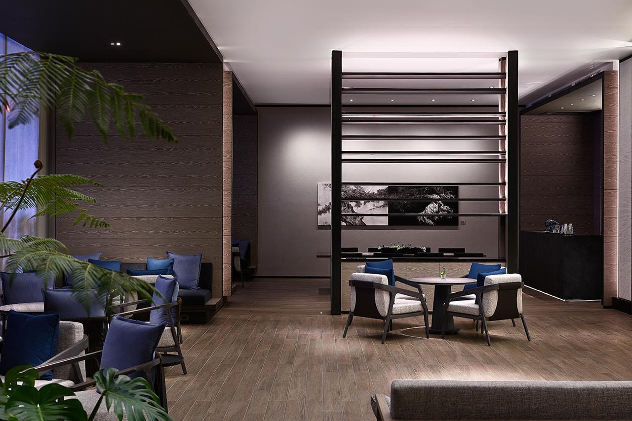 โรงแรมมู่ เจียว สี เจียวซี ภายนอก รูปภาพ The interior of the lounge