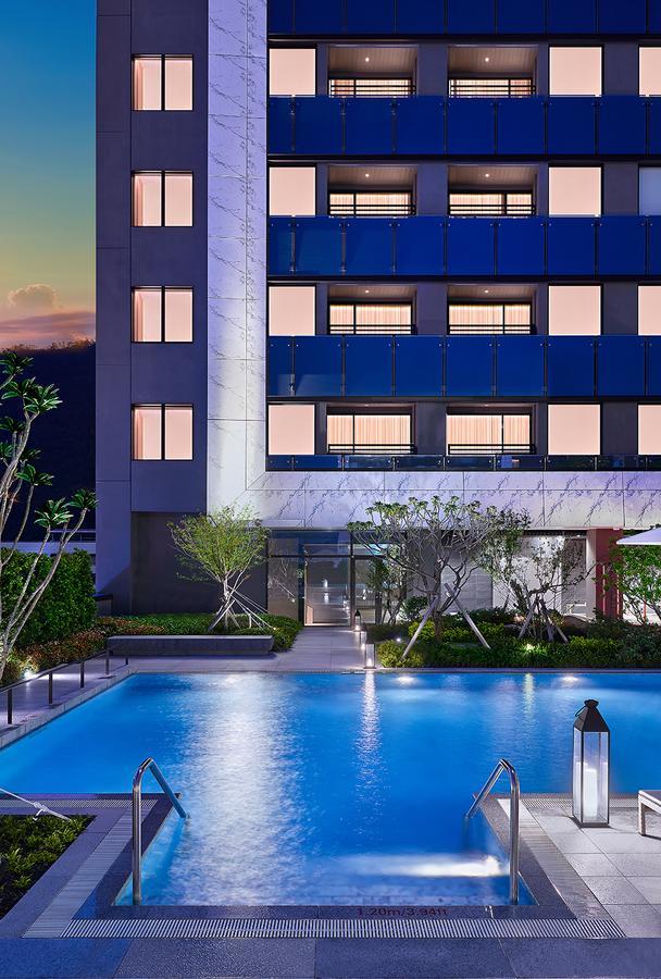 โรงแรมมู่ เจียว สี เจียวซี ภายนอก รูปภาพ The hotel's pool