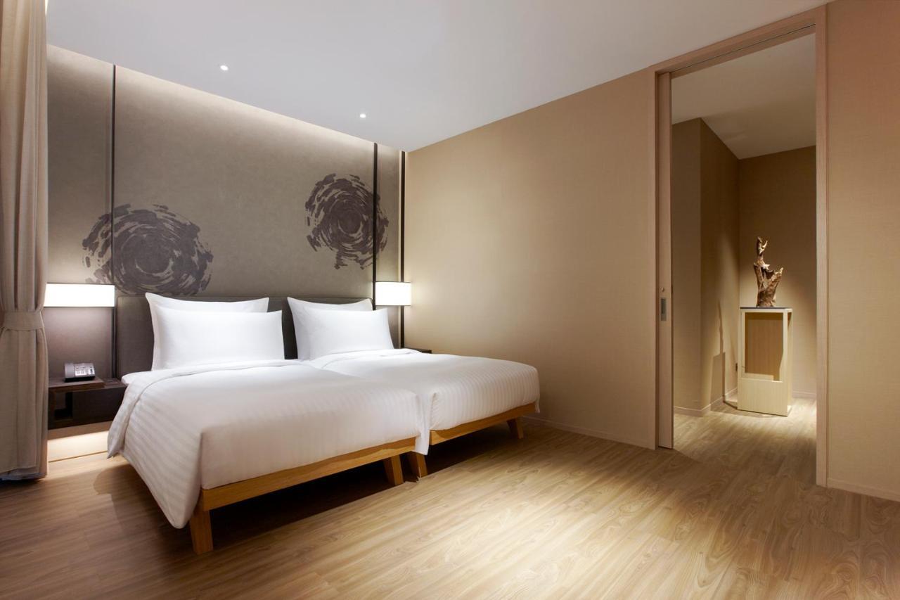 โรงแรมมู่ เจียว สี เจียวซี ภายนอก รูปภาพ Deluxe Room