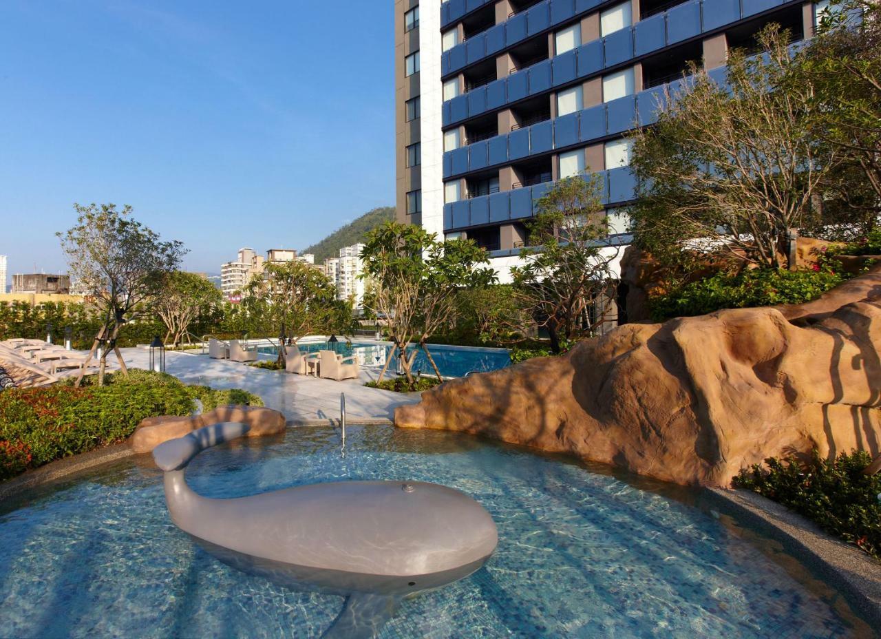 โรงแรมมู่ เจียว สี เจียวซี ภายนอก รูปภาพ The outdoor swimming pool