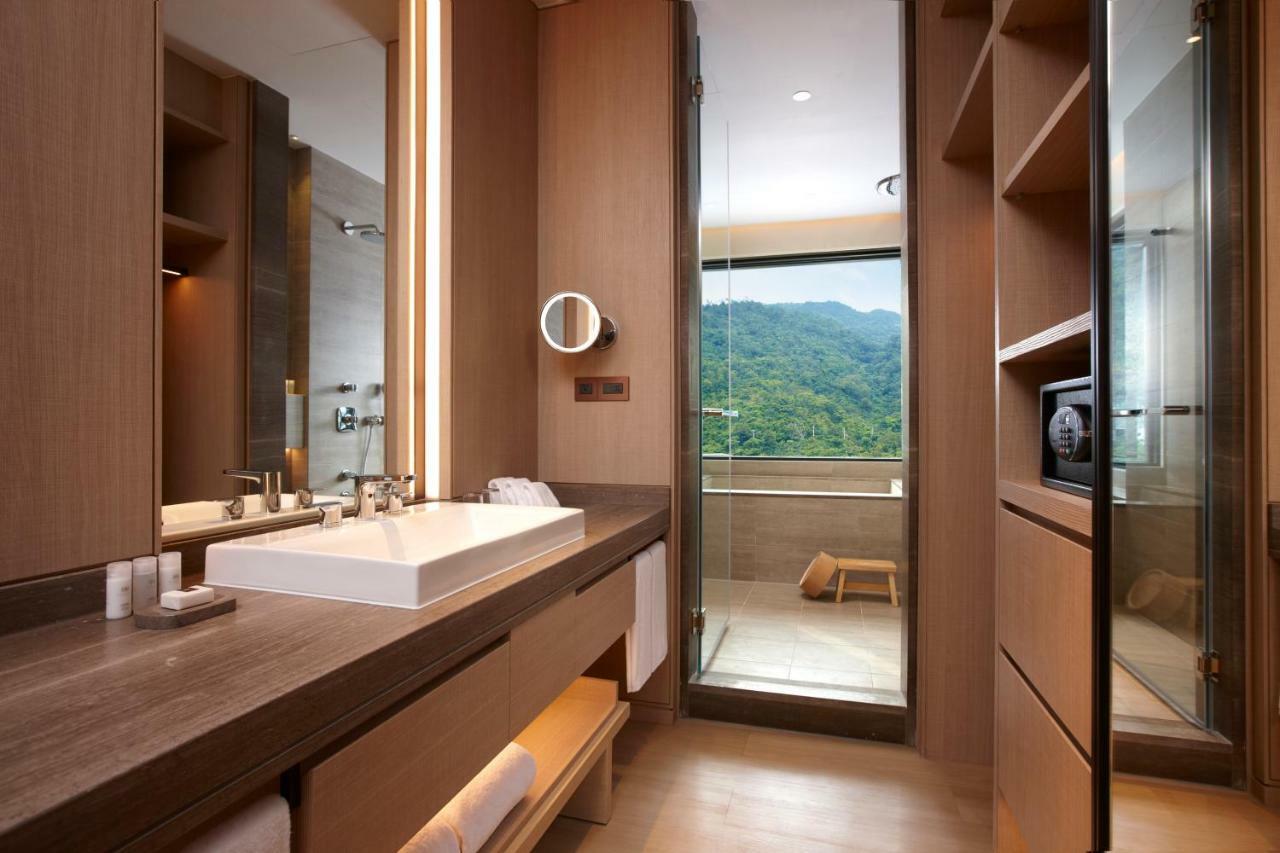 โรงแรมมู่ เจียว สี เจียวซี ภายนอก รูปภาพ Bathroom